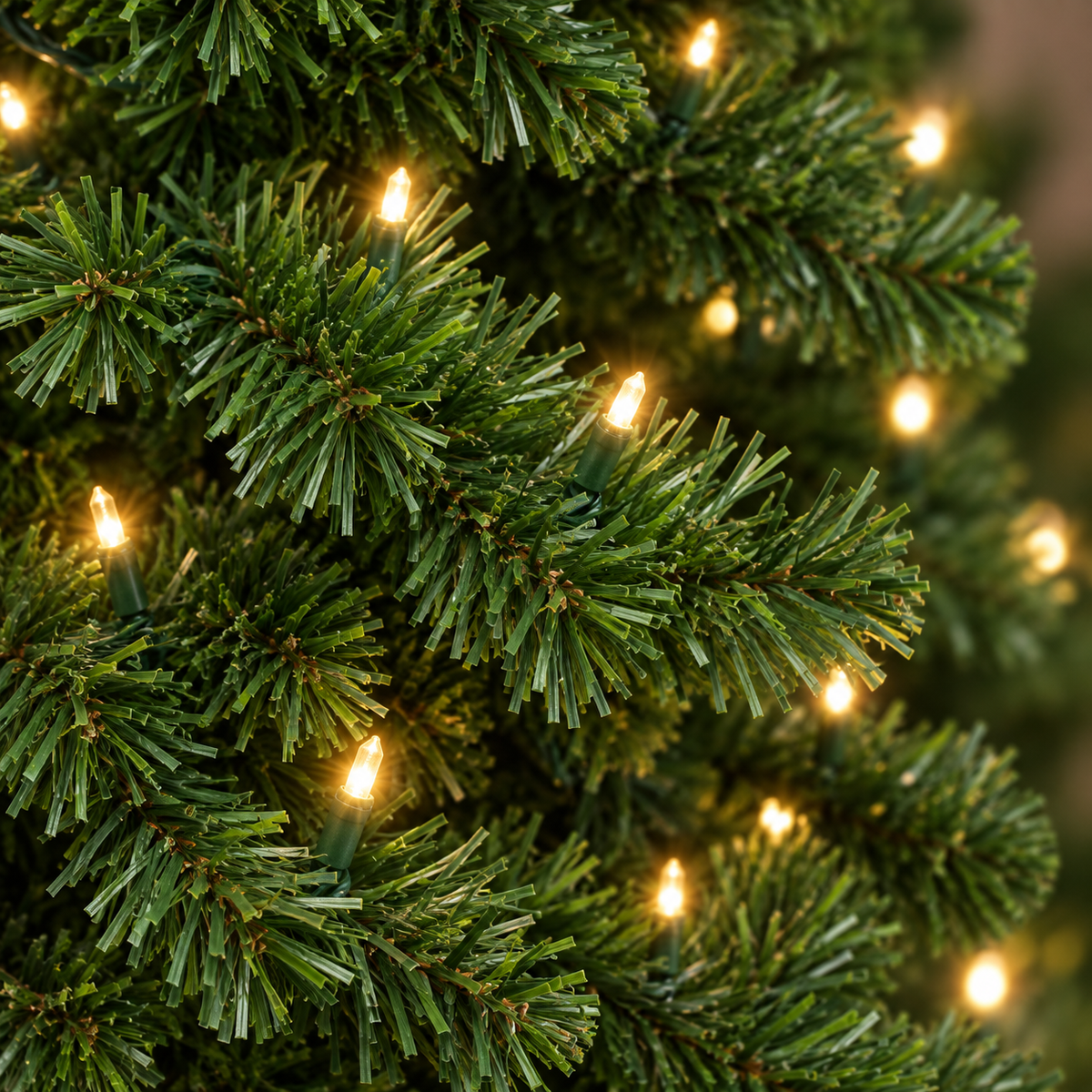 AI-generated illustrative close-up of green artificial branches and warm white lights based on the ShopNEW pencil tree reference; fine details are illustrative.