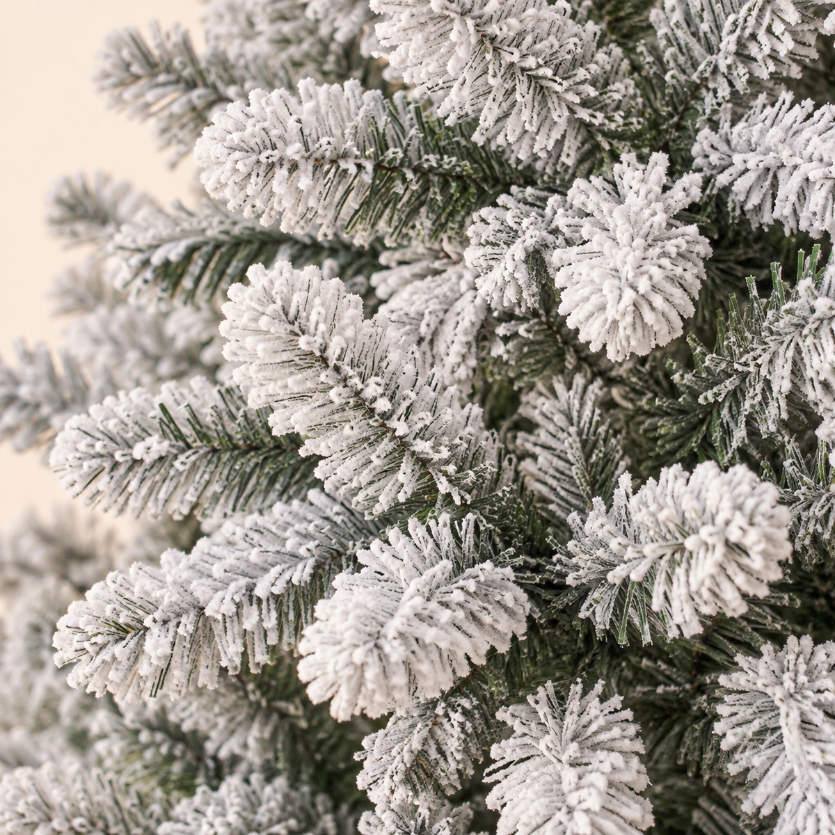 AI-generated close-up illustration of snow-flocked branches based on the ShopNEW 7 ft flocked tree product reference.